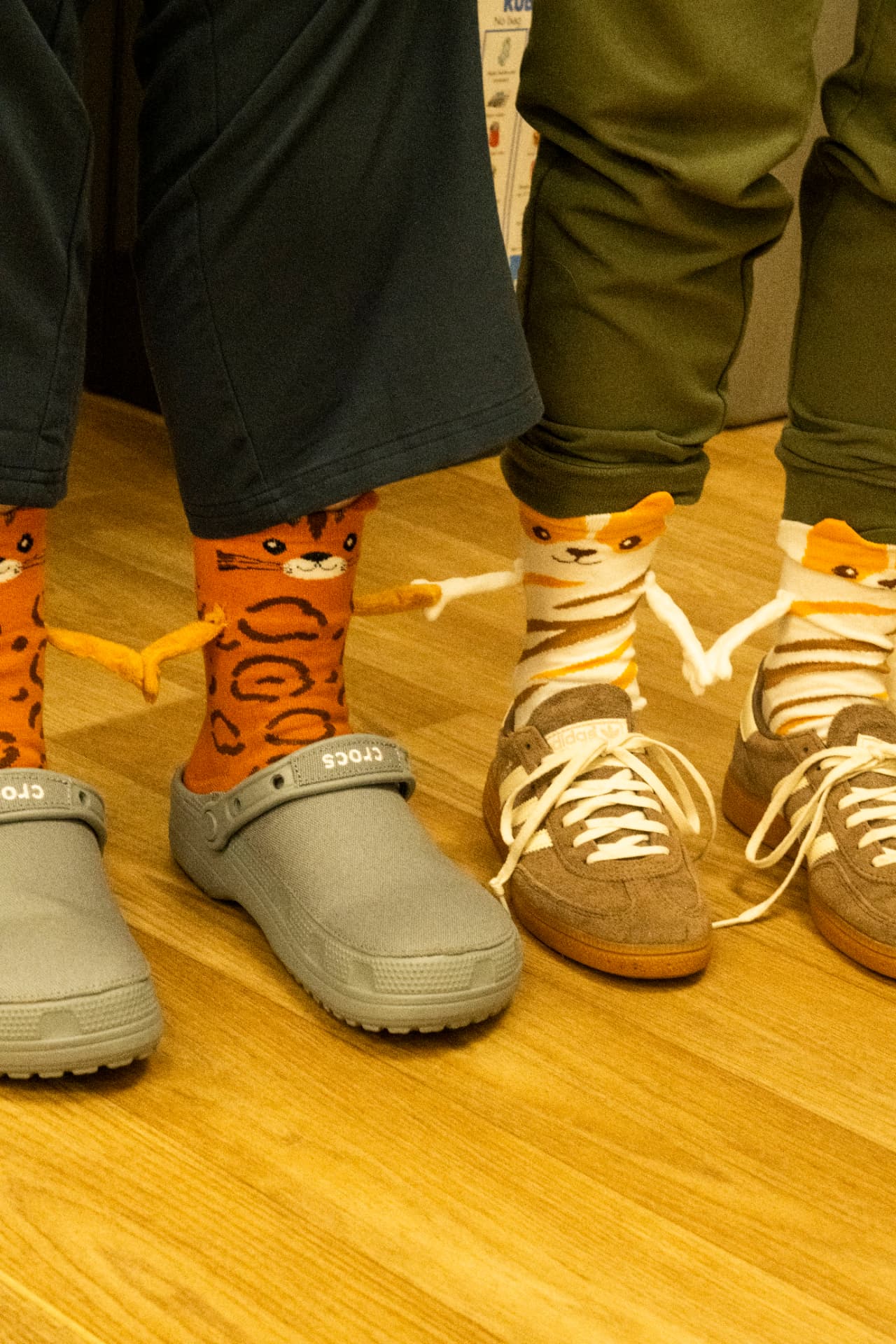 Team members wearing animal-print socks